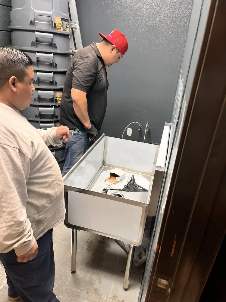Commercial plumbing and sink installation in Tea